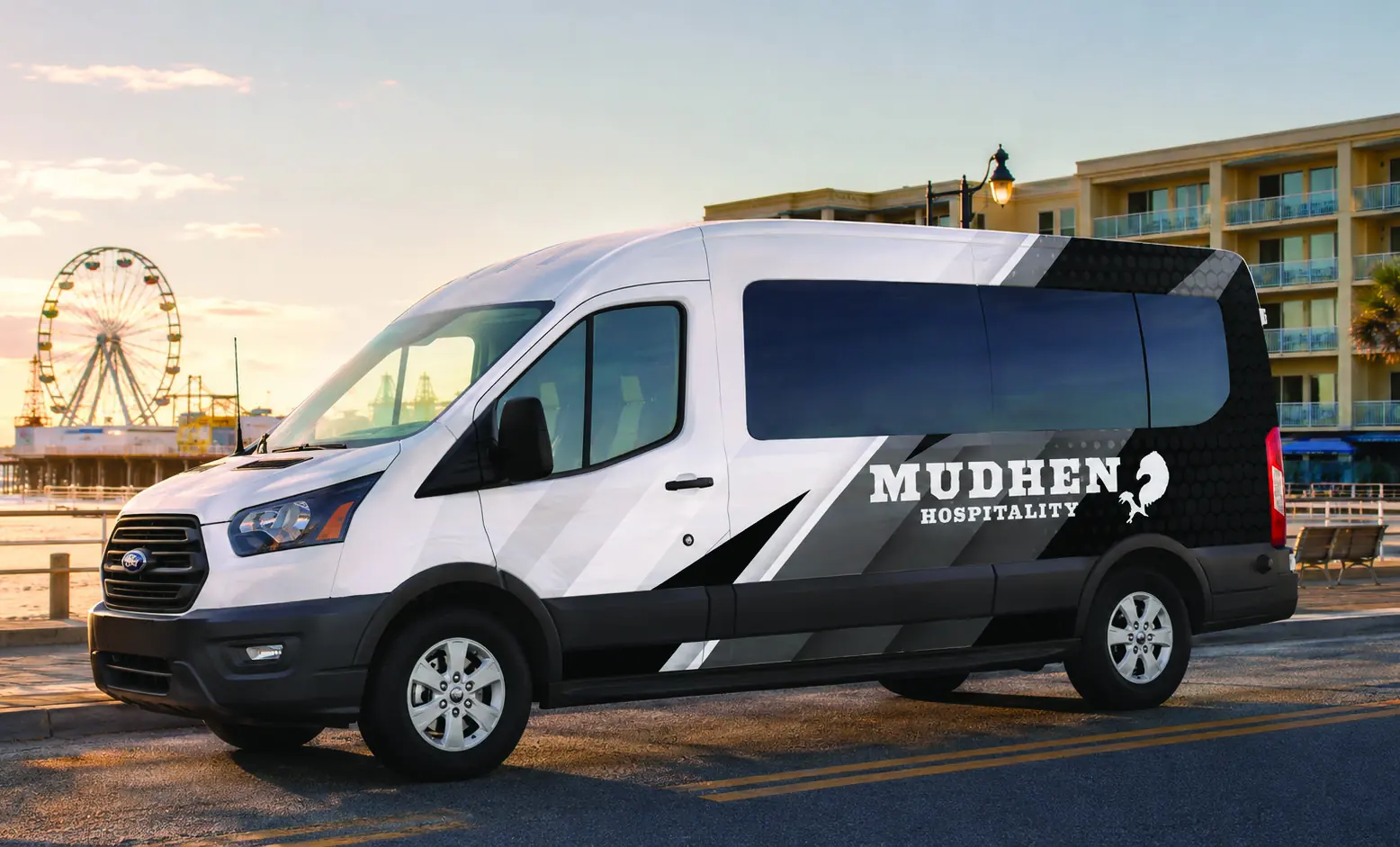 The MudHen Hospitality 12-passenger shuttle van parked on the Wildwood boardwalk at sunset